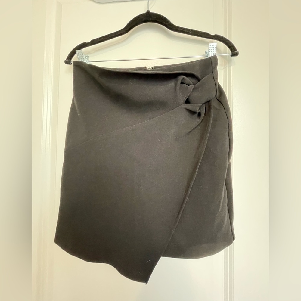 Black asymmetrical tulip shaped mini skirt